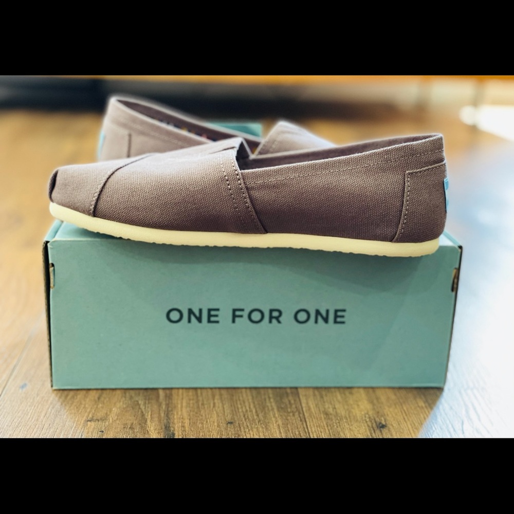 TOMS. Women’s size 6.5. Grey. Never worn.